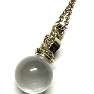Momento Mori Necklace with a Pool of Light Pendant